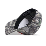 The Oklahoma State Outland Hat by No Rivals features a camouflage cotton design, curved brim, structured fit, and adjustable snapback. Shown on its side, the black interior band displays NO RIVALS branding.