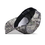 The Texas State Outland Hat by No Rivals is shown upside down, revealing its black inner band with "NO RIVALS" printed in white. This camo-patterned snapback baseball cap is crafted from high-quality cotton and has a structured fit against a white background.