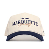 The No Rivals Marquette Vintage Hat is a cream cotton baseball cap with "EST 1881 MARQUETTE University" embroidered in navy and gold, a navy blue brim, and a comfy snapback closure.