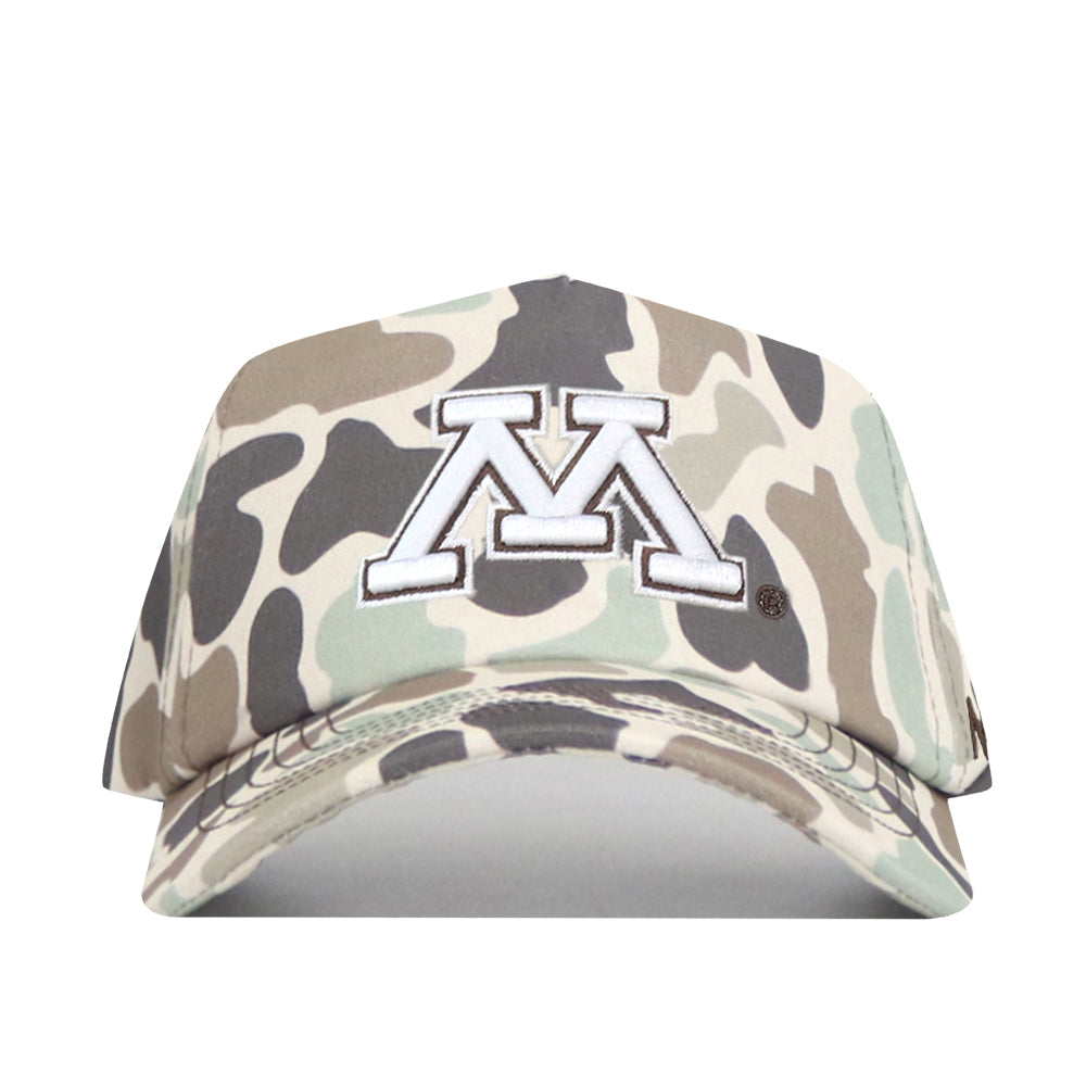 The Minnesota Gophers Huntsman Hat by No Rivals is a camouflage baseball cap with a prominent white letter M outlined in black at the center front and an embroidered logo for extra durability. Its snapback closure offers an adjustable, secure fit—perfect for gameday.