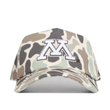 The Minnesota Gophers Huntsman Hat by No Rivals is a camouflage baseball cap with a prominent white letter M outlined in black at the center front and an embroidered logo for extra durability. Its snapback closure offers an adjustable, secure fit—perfect for gameday.