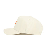 The No Rivals Tennessee Sideline Hat is a cream snapback with a structured fit, curved brim, orange front embroidery, and small white NR embroidery on the side above the ear.