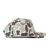 A side view of the No Rivals Minnesota Gophers Huntsman Hat showcases its camouflage pattern in green, beige, and brown hues. The baseball cap features a curved brim, an embroidered logo for the perfect Gameday Fit, and a Snap Back Adjustment for customizable comfort.