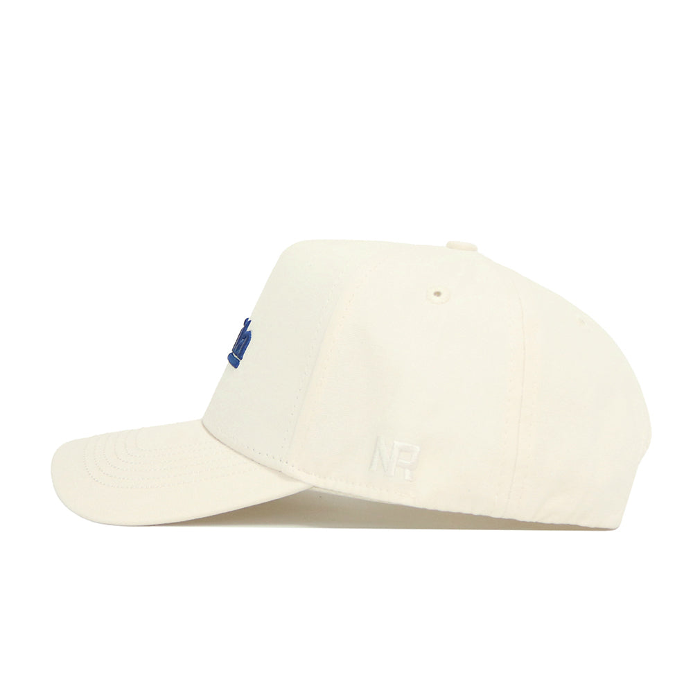 The No Rivals Florida Sideline Hat is a beige baseball cap shown in side view, crafted from high-quality cotton with a structured fit and subtle embroidered "NR" initials near the back.