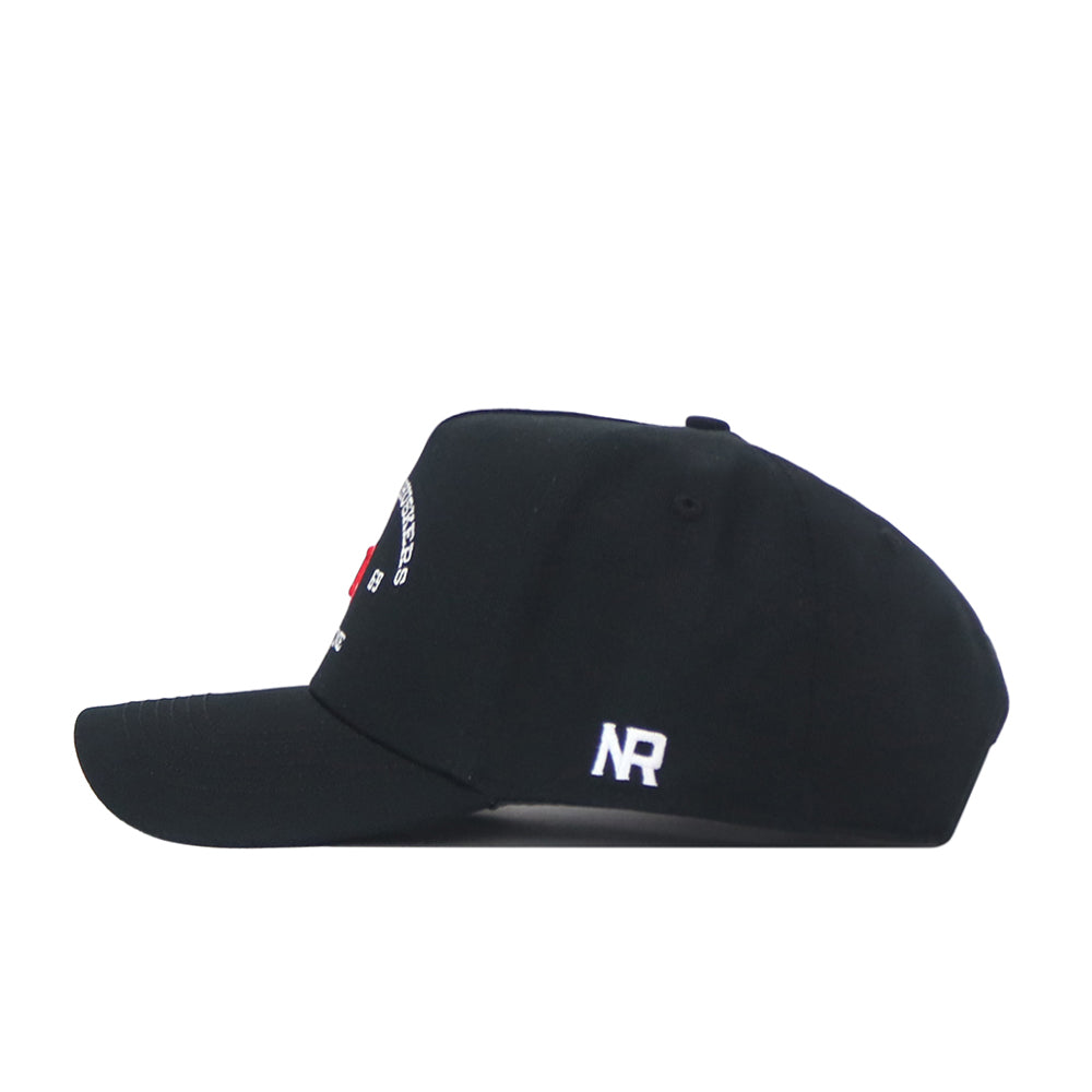 The Nebraska Outlaw Hat - Black by No Rivals is a black snapback hat shown from the side, featuring a white embroidered NR logo on the back and partial white and red embroidery on the front—perfect for completing your gameday fit.