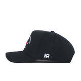 The Nebraska Outlaw Hat - Black by No Rivals is a black snapback hat shown from the side, featuring a white embroidered NR logo on the back and partial white and red embroidery on the front—perfect for completing your gameday fit.