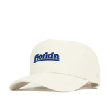 The No Rivals Florida Sideline Hat is a white cotton baseball cap with "Florida" embroidered in blue, featuring a curved brim, structured fit, and an adjustable strap at the back.