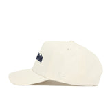 The No Rivals West Virginia Sideline Hat is a cream snapback made of quality cotton, featuring subtle side embroidery, a dark embroidered front logo, and a structured fit.