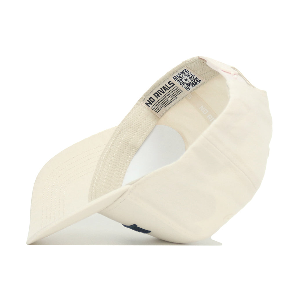 The West Virginia Sideline Hat by No Rivals is shown inside out, revealing the NO RIVALS label on the sweatband and a QR code. This cream snapback cap features quality cotton, a structured fit, visible stitching, and a curved brim.