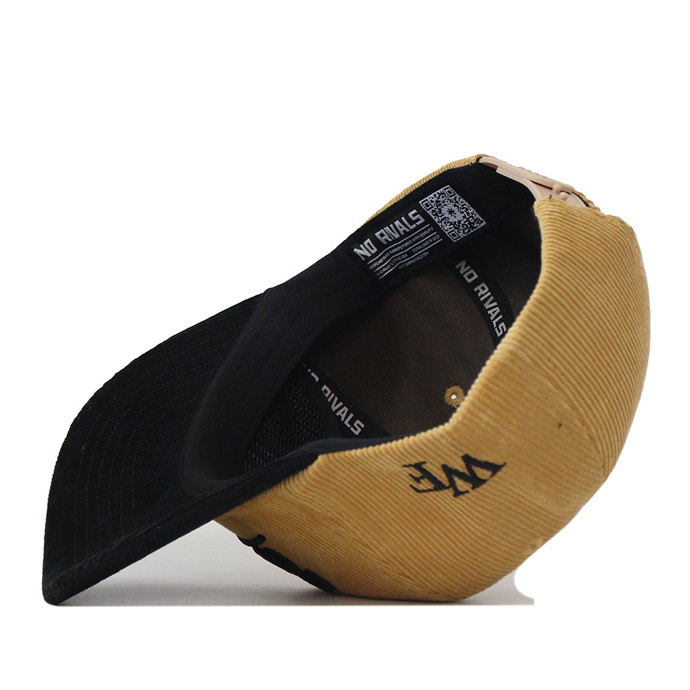 The Wake Forest 2 Tone Gold Rush Hat by No Rivals is displayed upside down, highlighting its unstructured fit, black interior, QR code label, and the NO RIVALS branding printed inside.