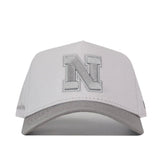 Give your gameday look a finishing touch with the Nebraska Graphite Hat from No Rivals—a light gray snapback featuring a prominent, embroidered “N” logo in matching graphite thread on the front panel.