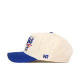 The Kansas Jayhawks Stride Hat by No Rivals is a cream-colored baseball cap with a blue brim, showcasing the officially licensed Jayhawk logo and “Kansas” text embroidered on the front. The initials “NR” are stitched in blue on the side, and its snapback design offers an adjustable, comfortable fit.