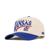 Show your team pride with the Kansas Jayhawks Stride Hat by No Rivals. This officially licensed beige and blue snapback cap features embroidered KANSAS JAYHAWKS text and the iconic Jayhawk mascot logo on the front, along with NR initials on the side of the brim.