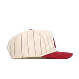 The No Rivals Washington State Pinstripe Hat is a cream cotton baseball cap with thin maroon pinstripes, a solid maroon bill, and is displayed from the side.