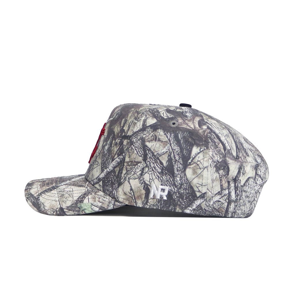 The Washington State Outland Hat by No Rivals is shown in a side view, featuring a camouflage pattern, flat brim, white embroidered NR initials on the side, and an adjustable snap back closure—perfect for gameday.
