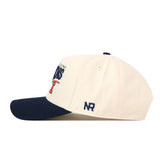 Show your Illinois spirit with the No Rivals Illinois Fighting Illini Stride Hat. This snapback features a cream crown with vent holes and visible stitching, a navy blue brim, and an "NR" stitched on the side—making it the perfect finishing touch for your gameday look.