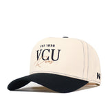 Introducing the VCU Rams Vintage Hat by No Rivals. This beige snapback features a striking black brim and showcases a bold embroidered “VCU Rams EST 1838” logo in black and gold on the front—perfect for elevating your gameday style.