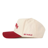 A side view of the Right Side Up Hoosiers Hat - Classic Colors by No Rivals, featuring a cream-colored snapback design with a red brim. “NO RIVALS” and an embroidered logo are stitched in red near the back.