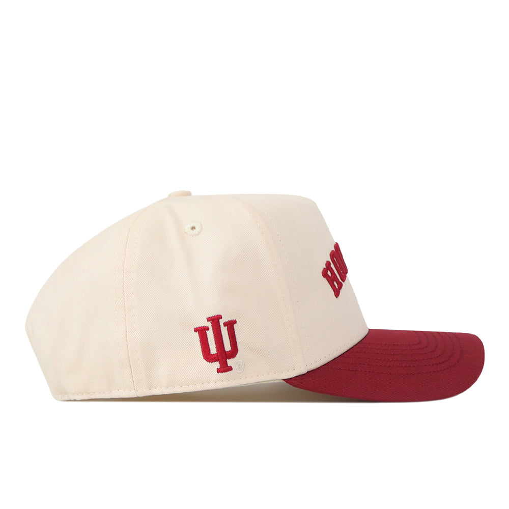 Check out the Right Side Up Hoosiers Hat - Classic Colors by No Rivals, featuring a cream-colored crown and red bill. The officially licensed Indiana University logo is embroidered on the side, while part of “HOOSIERS” appears in bold red letters on the front. An adjustable snap back ensures a comfortable fit.