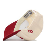 A cream and red Right Side Up Hoosiers Hat by No Rivals, turned inside out to display a tag with the brand’s name and a maroon embroidered logo on the side.