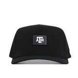The No Rivals Texas A&M Trainer Hat is a black structured snapback featuring a rectangular front patch with white A T M letters on a black background.