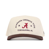 The No Rivals Alabama Outlaw Hat - Classic is a cream snapback with a brown brim, crafted from quality cotton and featuring "Alabama Crimson Tide," "1831," and "Tuscaloosa, AL" embroidered in maroon and black on the front.