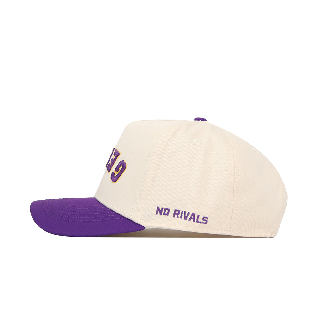 The Upside Down Geaux Hat - LSU - Classic by No Rivals is a cream snapback with a structured fit, purple brim, and "NO RIVALS" embroidered in purple on the side. Made from high quality cotton. Plain white background.