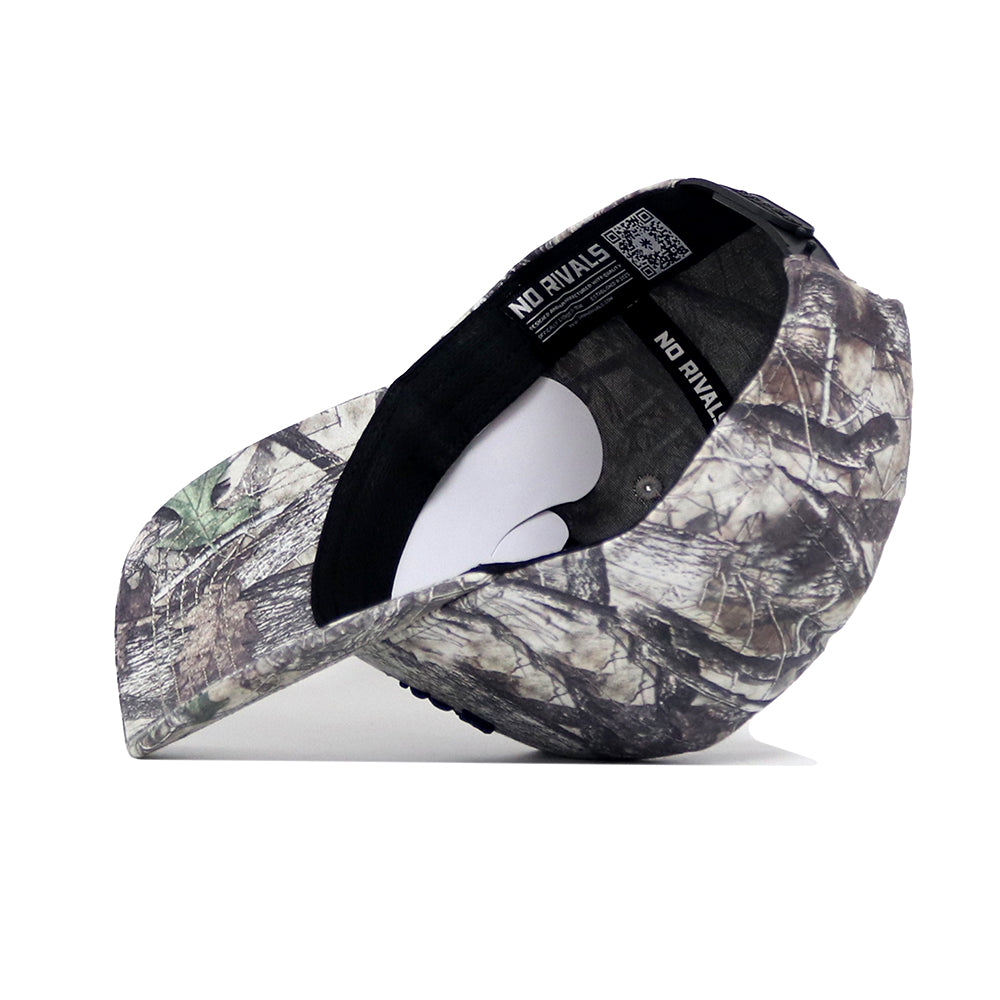 The Nevada Wolfpack Outland Hat by No Rivals features a structured fit, woodland camo print, high-quality cotton, "NO RIVALS" printed inside the black band, and a snapback for a perfect fit.