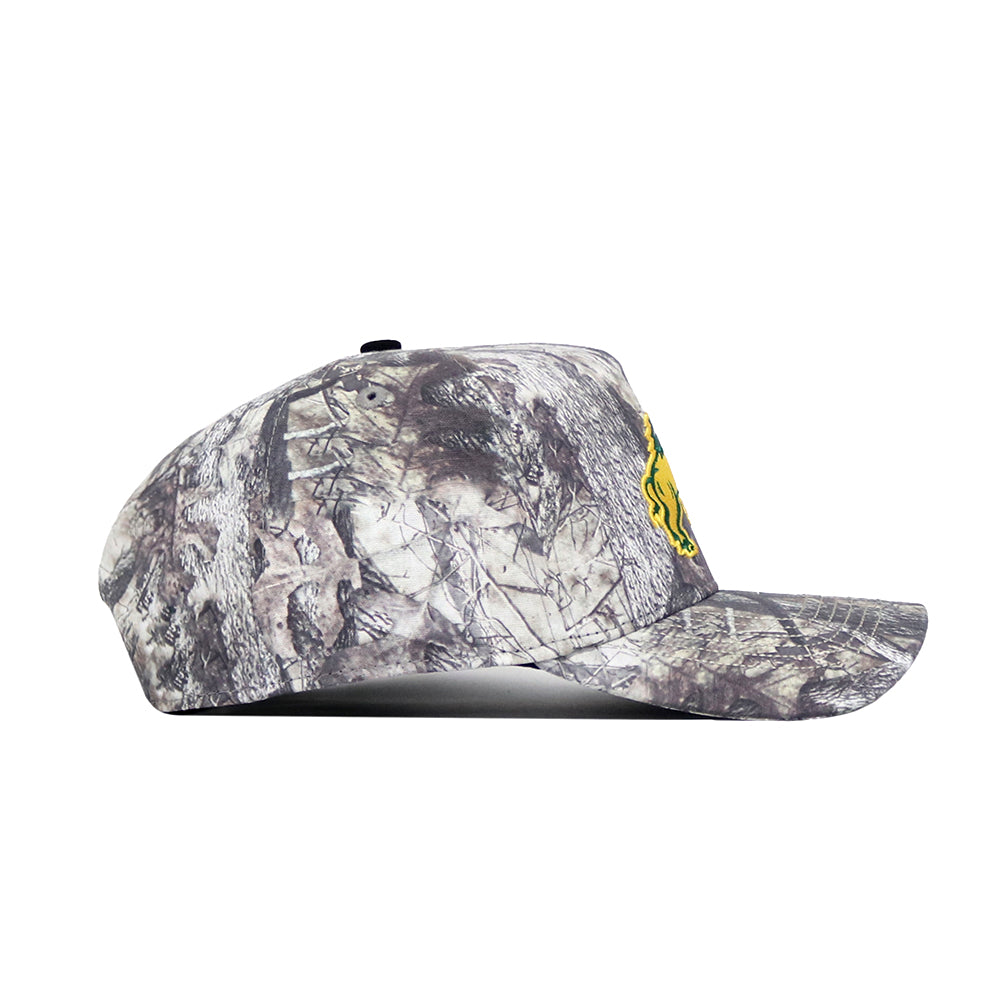 Side view of the No Rivals NDSU Outland Hat, featuring a gray and brown camo snapback design with a small yellow graphic on the front, made from high-quality cotton for a structured fit.
