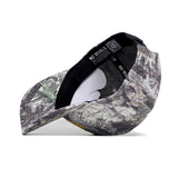 The NDSU Outland Hat by No Rivals is a camouflage snapback with a bent visor, white interior sticker, and a black inner band repeatedly printed with NO RIVALS. Made of high-quality cotton for comfort and durability.