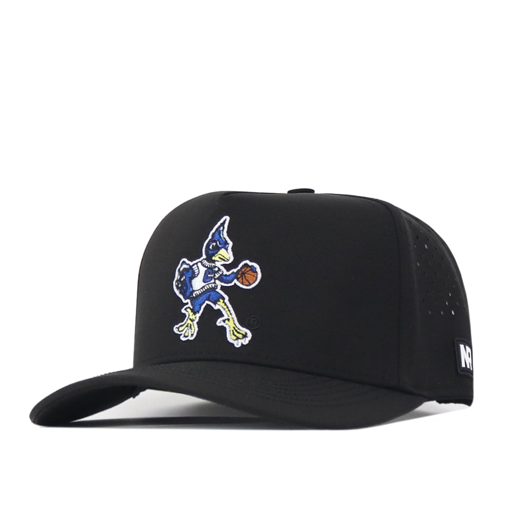 The Creighton Bluejays Basketball Hat in black by No Rivals features a cartoon bird dribbling a basketball embroidered on the front and a small white logo on the side. Made from performance fabric, this hat is designed with a snap back closure for a comfortable and adjustable fit.