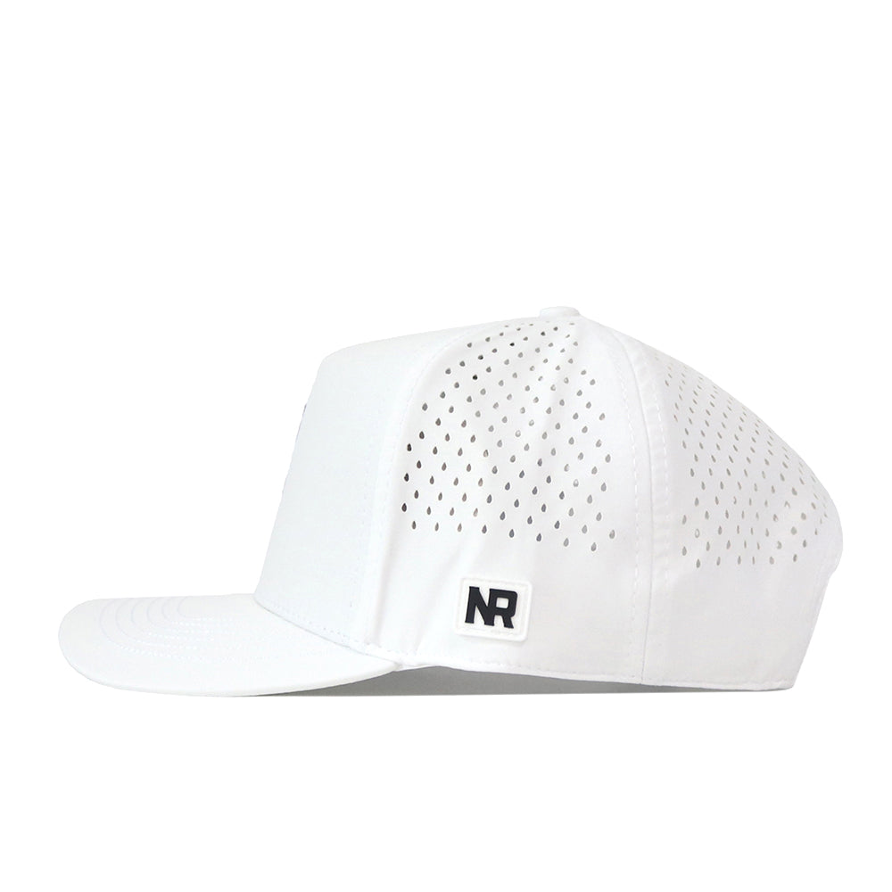 Introducing the JMU Dukes Golf Hat in white by No Rivals—a stylish baseball cap featuring small perforated side holes for breathability and a flat brim. The hat is adorned with a bold black-and-white embroidered NR logo patch near the back, while its classic snapback closure ensures a customized, comfortable fit—perfect for completing your ultimate gameday look.