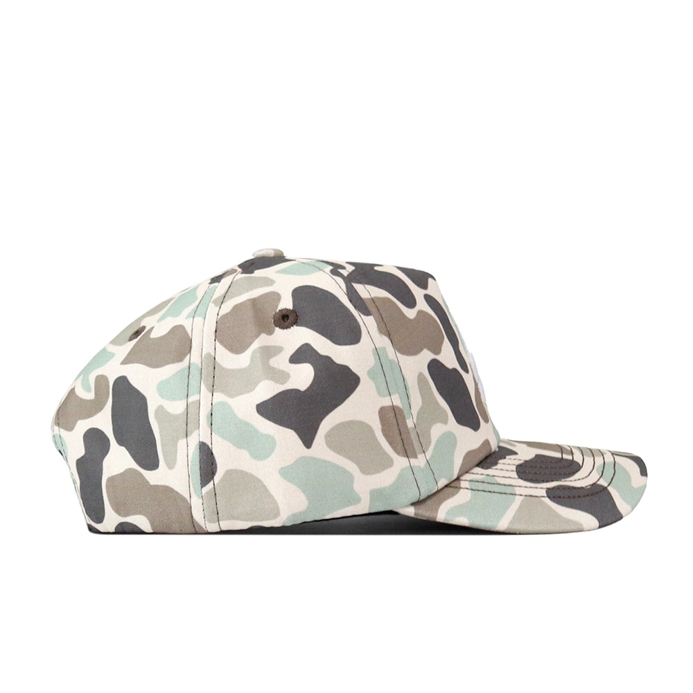 A side view of the No Rivals Texas State Huntsman Hat with a green, beige, brown, and black camouflage pattern against a white background showcases its stylish snapback design and embroidered logo—perfect for completing your gameday fit.