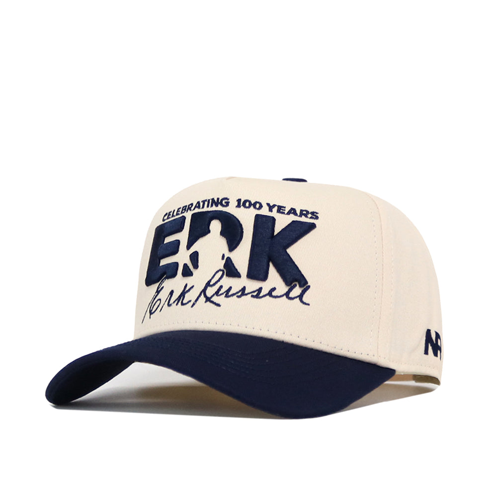 A cream and navy Georgia Southern Erk Russell Hat by No Rivals, this officially licensed snapback baseball cap features "CELEBRATING 100 YEARS ERK Erk Russell" embroidered on the front, along with a silhouette, an embroidered logo, and "ARP" on the side.