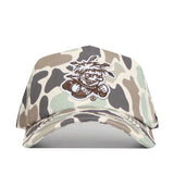 The Wichita State Huntsman Hat by No Rivals is a camouflage cap with an embroidered spiky-haired, feathered cartoon holding a football. Made from quality cotton, it features adjustable snap back for a custom fit.
