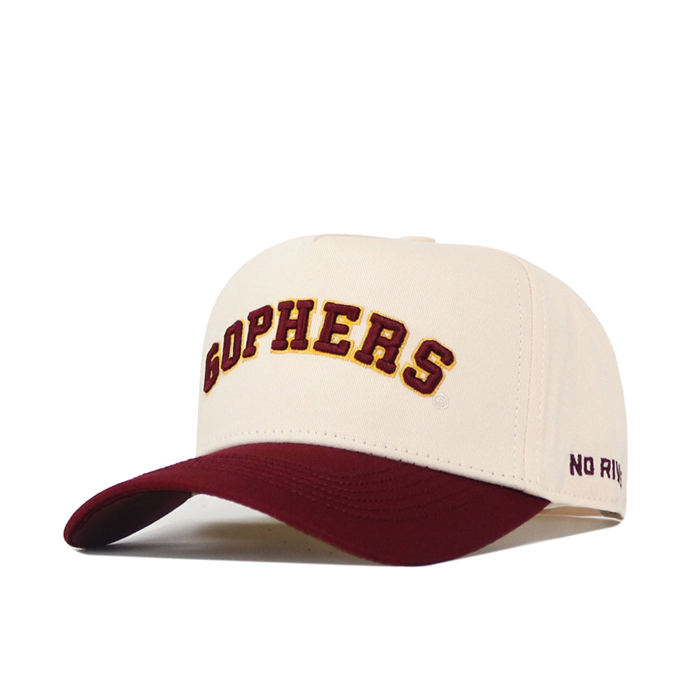 Here’s a rewritten sentence using your product data: The No Rivals Right Side Up Gophers Hat - Minnesota - Classic is a cream-colored snapback cap with "GOPHERS" embroidered in maroon and gold on the front and a maroon brim. This officially licensed hat also features partially visible small text on the side.