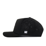 A black TCU Horned Frogs Football Mascot Hat from No Rivals, featuring ventilation holes on the side and an embroidered NR logo patch near the back. Crafted from performance fabric, this snapback cap is displayed in a side profile against a white background.