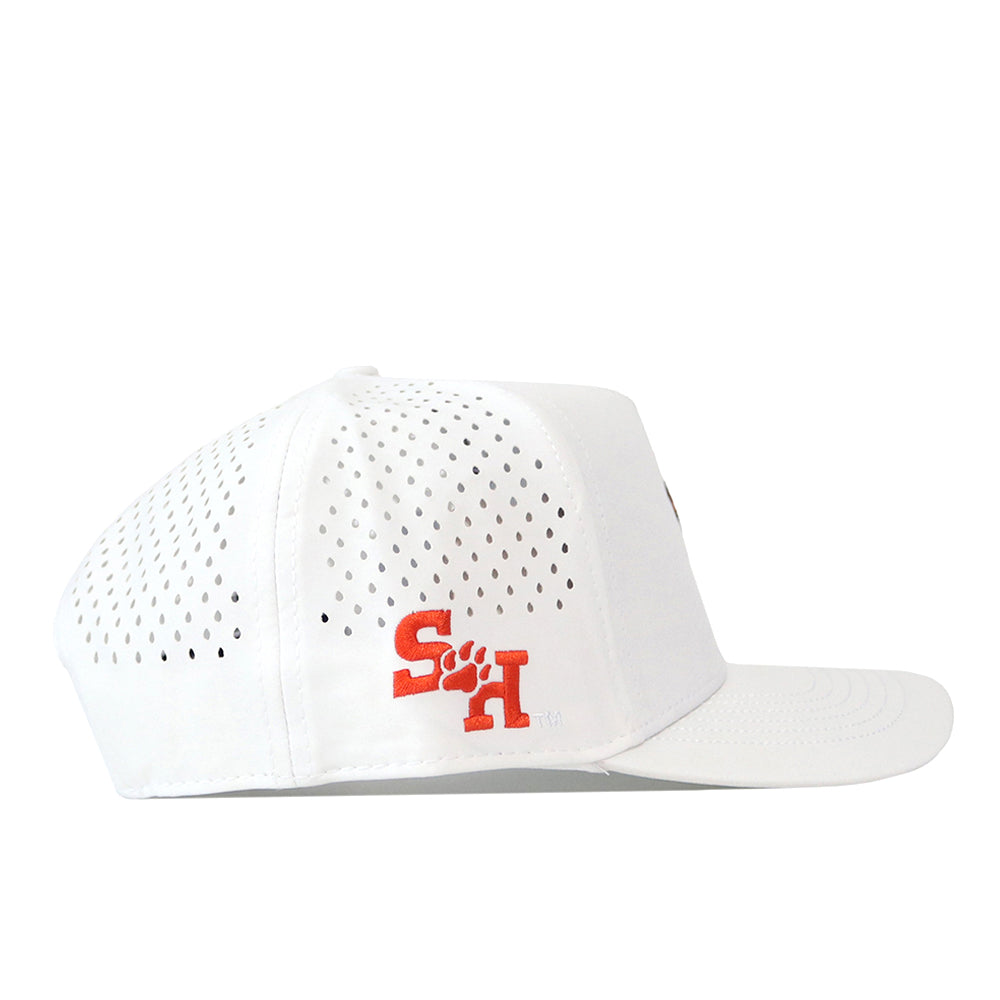 Introducing the Sam Houston State Football Sammy Hat - White from No Rivals. This officially licensed cap is crafted from performance fabric with ventilation holes and showcases an orange SH logo alongside a paw print on the side. Designed for comfort, it features a convenient snap back closure for an adjustable fit.