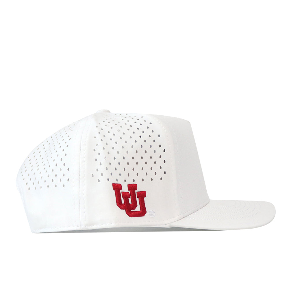 The Utah Utes Football Mascot Hat - White by No Rivals features small ventilation holes and a red interlocking UU embroidered logo on the front left. Crafted from performance fabric, this cap includes a flat bill, structured crown, and an adjustable snapback closure.