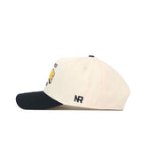The No Rivals App State - Letterman Collection - 2 is a cream snapback hat with a black brim, featuring officially licensed NR embroidered logos in black on the left side above the ear.