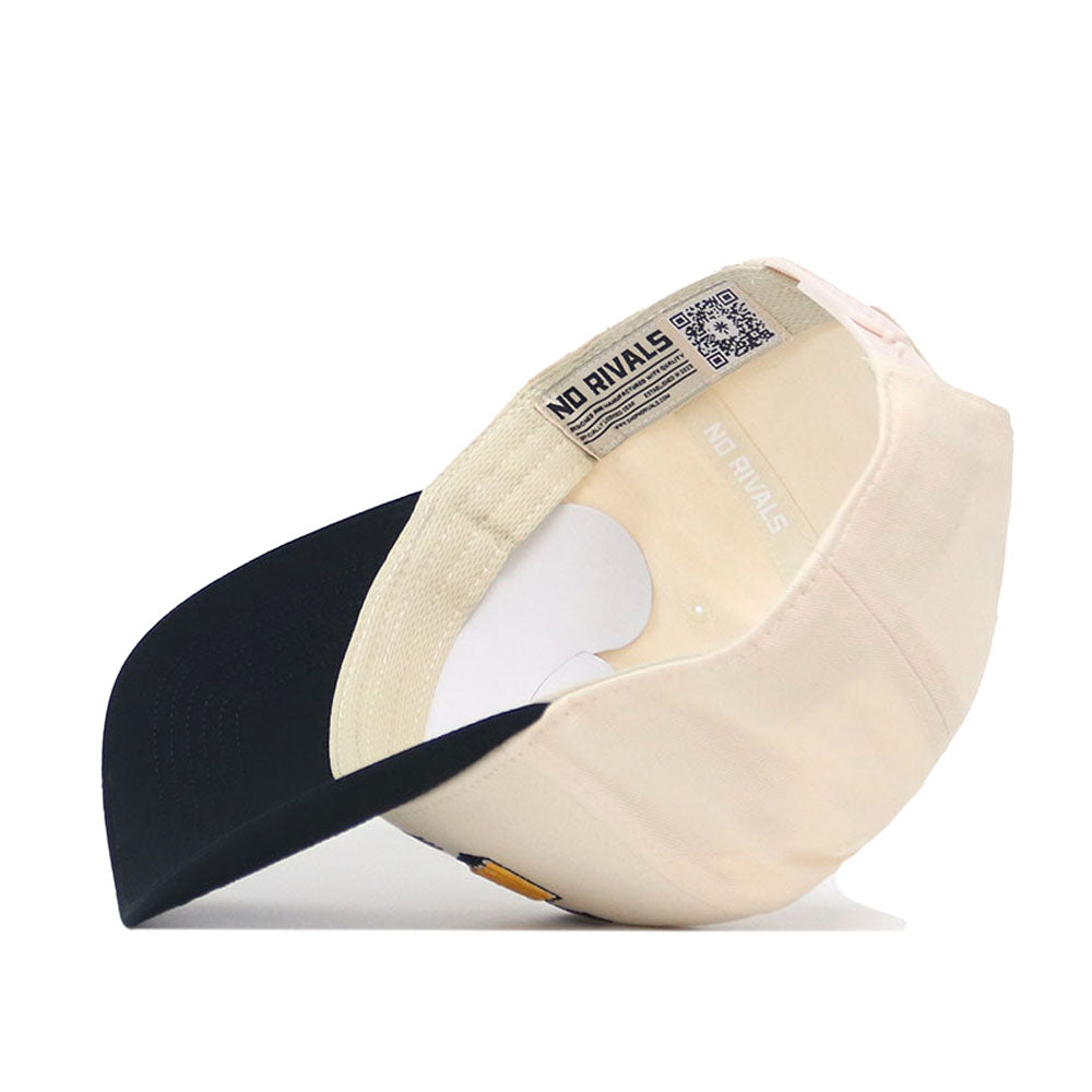 A beige and black snapback hat from No Rivals' App State Letterman Collection - 2 is shown upside down, displaying the inside NO RIVALS label, a QR code on the inner band, and embroidered logos. The brim is black; the crown is light beige.