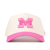 Show your support in style with the Michigan Pink Out Hat by No Rivals—a white snapback baseball cap featuring a large pink letter M on the front and a pink brim, officially licensed as a breast cancer awareness hat.