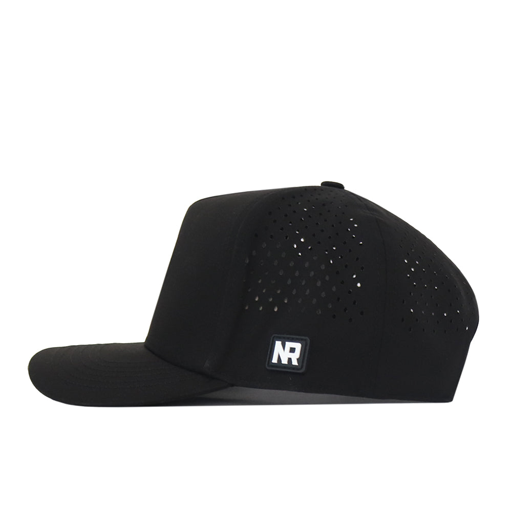 A left-side profile view of the Utah Utes Football Mascot Hat in black by No Rivals, featuring small side perforations and a square embroidered NR logo patch on the side, crafted from performance fabric.