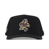 The No Rivals Vanderbilt Commodores Football Mascot Hat in black features an embroidered running cartoon mascot dressed as a colonial soldier, with gold and beige details on the uniform. Made from performance fabric, this snapback cap is displayed from the front.