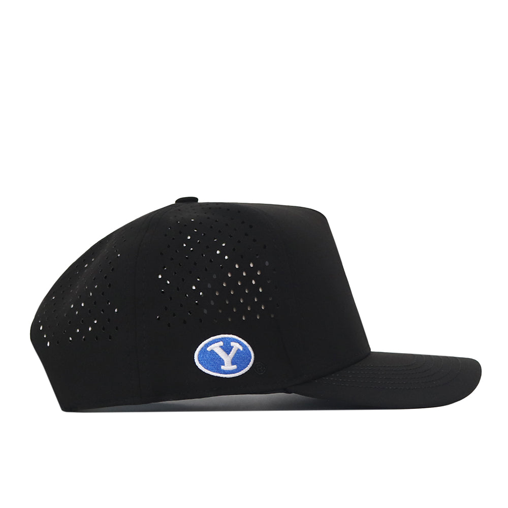 Side view of the BYU Cougars Football Mascot Hat by No Rivals in black, featuring small ventilation holes and a blue and white embroidered logo patch on the side. This cap offers a flat brim, structured crown, and an adjustable snap back closure for a customized fit.