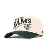 The Colorado State Rams Stride Hat by No Rivals is a beige and green snapback featuring bold embroidered Colorado State Rams lettering on the front with a ram logo below, shown angled on a white background. It's perfect for completing your gameday fit.