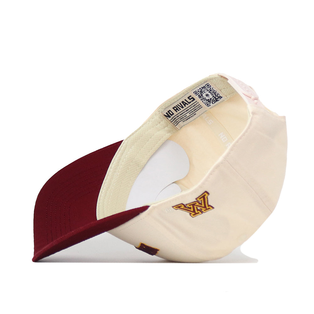 A Right Side Up Minnesota Hat - Classic by No Rivals is displayed upside down, showcasing an officially licensed gold embroidered M logo on the side and an interior label featuring text and a QR code.