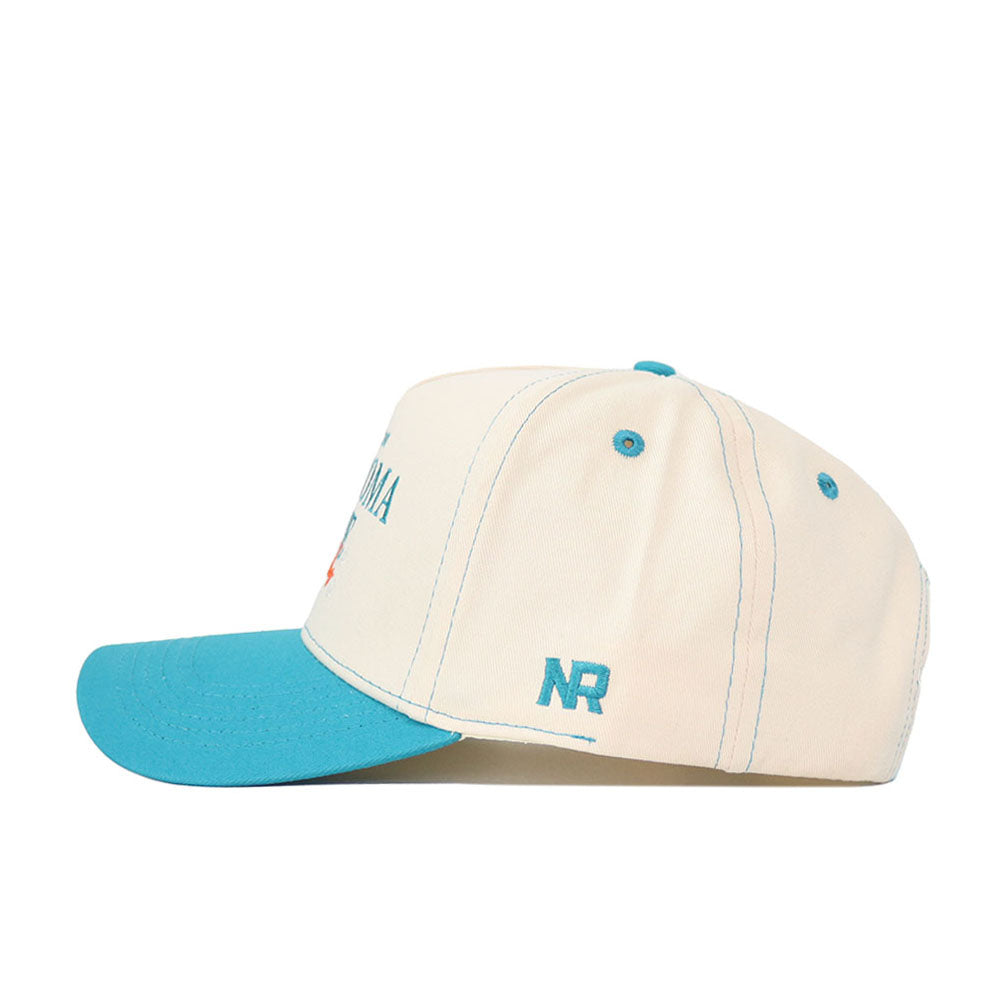 The OSU N7 Vintage Hat by No Rivals features a cream cotton build, turquoise brim and button, blue NR side logo, blue panel stitching, and an adjustable snapback for a perfect fit.