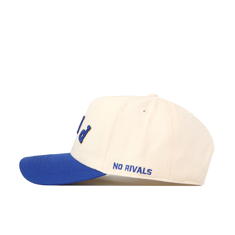 The Pittsburgh Panthers Upside Down Pitt Hat - Classic by No Rivals is a cream-colored snapback baseball cap with a blue brim, featuring “NO RIVALS” embroidered in blue above the brim.