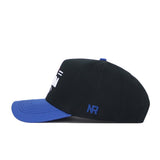 The No Rivals Florida Tailgate Hat is a black snapback with a blue curved brim, NR initials in blue near the back, and partial white text on the front. Made from high-quality cotton for a structured fit; side view shown.